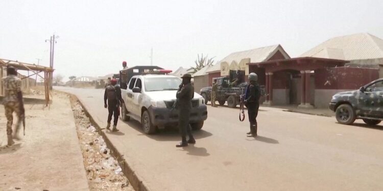 Security personnel patrol the streets amid a surge in violence in Mangu, Plateau State, Nigeria, January 24, 2024, in this screengrab obtained from video. Reuters TV via REUTERS