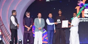 Akinola Davies Jr receives the Silver Peacock Special Jury Award for My Father’s Shadow at the 56th International Film Festival of India. Photo by PIB India