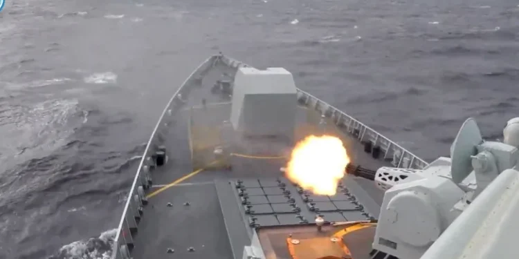 A ship fires a weapon during drills east of Taiwan, in this screenshot from a video released by the Eastern Theater Command of China's People's Liberation Army (PLA) on Monday [China's Eastern Theatre Command/Handout via Reuters/CNN]