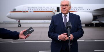 03 December 2025, Brandenburg, Schoenefeld: Germany's President Frank-Walter Steinmeier speaks at the military section of Berlin Brandenburg Airport before his departure for London. Photo: Bernd von Jutrczenka/dpa