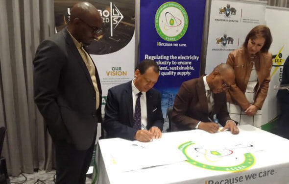 EEC Managing Director Enerst Mavuso signing the PPA with USL Managing Director Muzi Siyaya. Photo by Xolani Mngomezulu