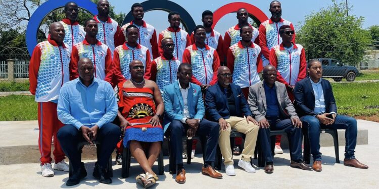 The Minister of Sports, Culture and Youth Affairs Bongani Nzima with officials pose for photos ahead of the teams tour. Photo: Ministry of Sports, Culture and Youth Affairs