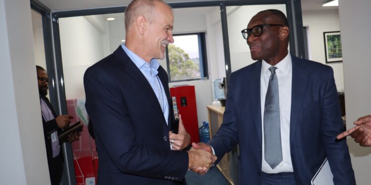 Matthew Pickard (Regional Leader, World Vision Southern Africa) and Ike B. Okorie (Country Representative, World Bank) in a strategic meeting to improve water services in Eswatini. Photo by World Vision Eswatini.