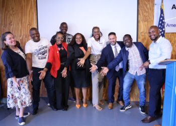 Marc Weinstock, U.S. Chargé d’Affaires in Eswatini, Carly Van Orman, Public Affairs Officer, Bertha Sithole, Chairperson of the U.S. Government Exchange Programs Alumni Association, and other alumni and delegates at the launch of the $12,000 U.S. Alumni Grant at American Corner Mbabane. Photo credit: U.S. Embassy Eswatini