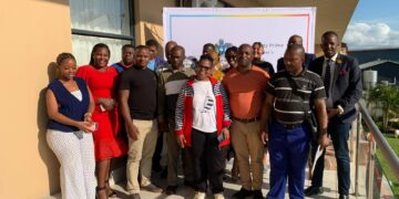 DPM Disability Unit staff and workshop participants gather at The George Hotel after completing the capacity building training. Photo credit DPMO