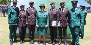 HMCS Commissioner General LaMakhosini Phindile Dlamini poses with officers from His Majesty’s Correctional Services at the MLDCC 8 graduation. Photo credit HMCS