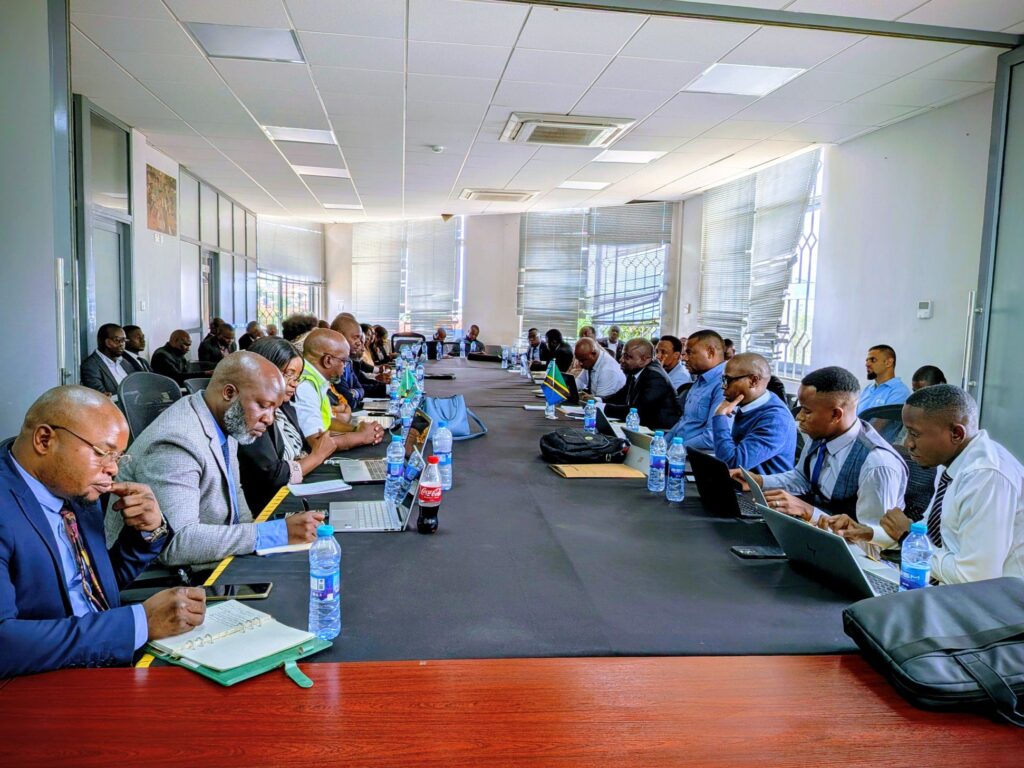 Delegates from Zambia and Tanzania sit across each other during bilateral discussions on the Simplified Trade Regime aimed at improving cross border trade procedures.