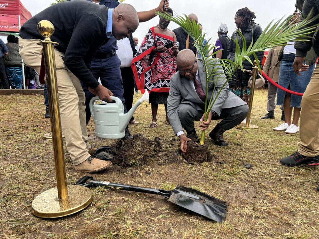 Honourable Minister of Commerce, Industry, and Trade Manqoba Khumalo planting a tree to mark the inauguration of the Ingelo cottage factory project at Lugongolweni