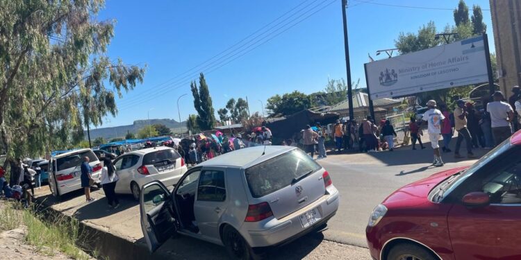 Applicants wait in line outside Maseru Passport Office for services on a busy Monday morning Photo by Lesotho News Agency