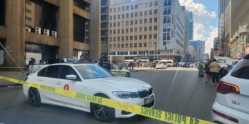 Police and forensic teams at the scene where DJ Warras was shot in Johannesburg’s CBD. Photo by X/@Chriseldalewis