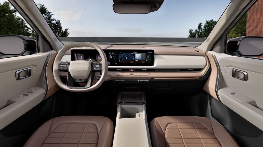 A rendered interior view of the new Kia Seltos displaying the dual 12.3 inch screens, upgraded materials and panoramic sunroof.
