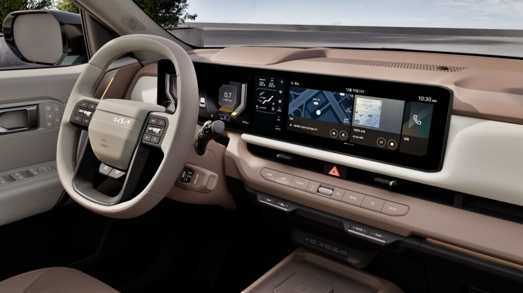 A rendered interior view of the new Kia Seltos displaying the dual 12.3 inch screens, upgraded materials and panoramic sunroof.