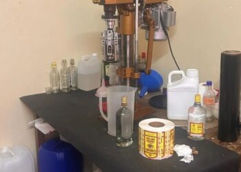 Police uncover illegal alcohol manufacturing plant in Lansdowne, seizing counterfeit production equipment and materials.