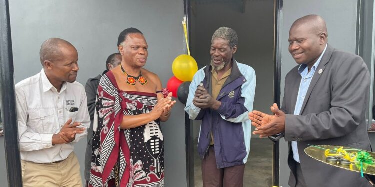 HRH Prince Lonkhokhela presents new homes and food parcels to displaced Mbondzela Farm families.