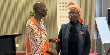 A delegate engages Margaret Thwala-Tembe, UNFPA Head of Office, in a meaningful discussion during the advocacy session. Photo by UNFPA Eswatini.