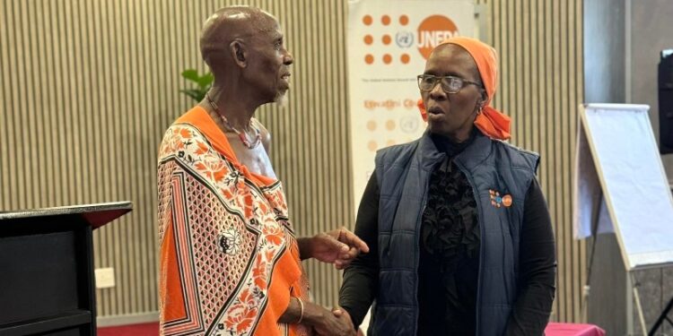 A delegate engages Margaret Thwala-Tembe, UNFPA Head of Office, in a meaningful discussion during the advocacy session. Photo by UNFPA Eswatini.