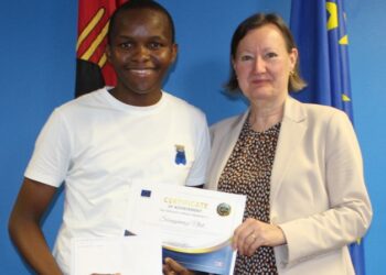 Sibongumenzi Ntuli receives his Eco Educator award from EU Head of Cooperation Eva Maria Engdahl at the EU Delegation offices in Mbabane on 15 December 2025. Photo by EU in Eswatini