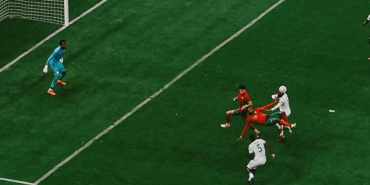 Ayoub El Kaabi in mid air as he scores a spectacular overhead kick to seal Morocco’s 2 0 victory over Comoros in their Afcon opener in Rabat. Photo X/@CAF_Online