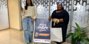 Tebenguni Nxumalo alongside her sister , during the gift presentation, picture taken by Sebenzile Bhembe