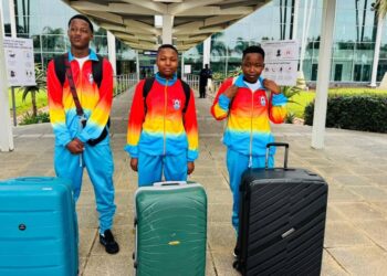 The three athletes, Siphosethu Gamedze, Sikhanyiso Dlamini and Mnotfo Simelane, before boarding at the KMIII International Airport. Photo: AE