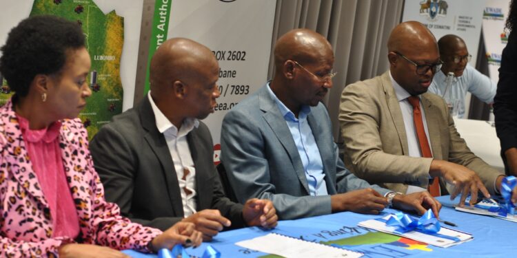 EWADE CEO Dr Samson Sithole signs the MoU with the Ministry of Tourism and Environmental Affairs, Ministry of Tinkhundla Administration and Development, and the Eswatini Environment Authority to advance smallholder farming.