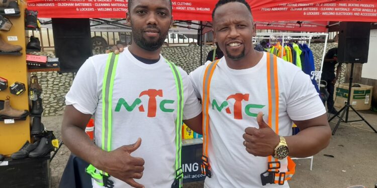 Mbabane Trading Company finance director, Thabo Kunene and Sifundo Dlamin, sales director at the marketing campaign. Photo by Nkosingiphile Myeni.