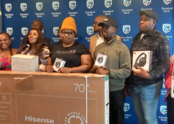 Winners of the Choose Standard Bank campaign pose for a group photo during the prize-giving event. Photo by Khulekile Mhlanga