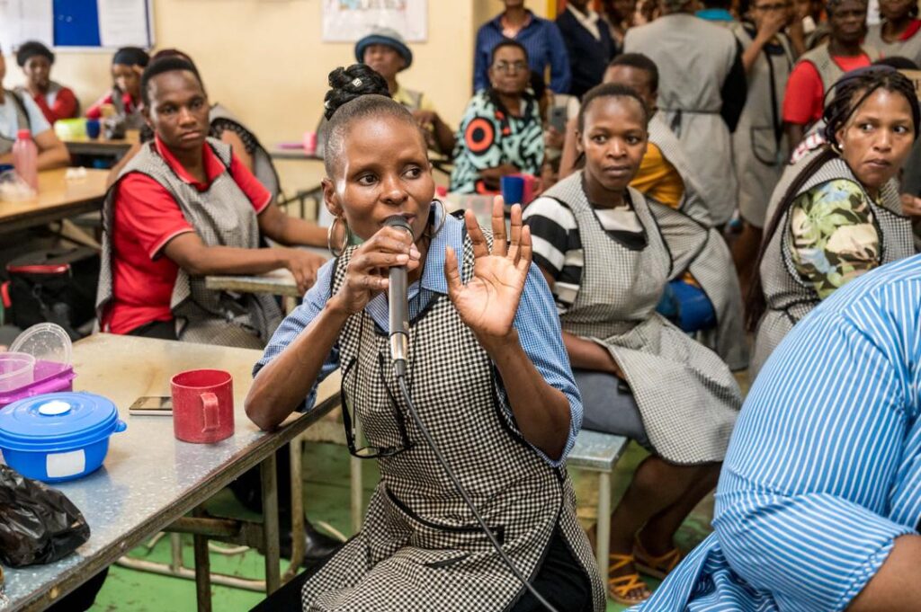 Workers from Fashion International and Sigma Clothing in Matsapha take part in a fraud awareness session aimed at protecting factory employees from financial scams. Photo by FNB Eswatini.