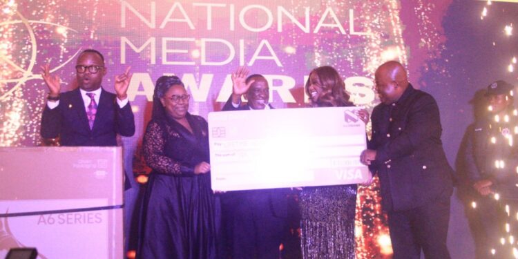 Channel S Managing Director Chawe Mamba receives the Lifetime Achievement Award at the Eswatini National Media Awards held at Royal Villas in Ezulwini on Monday night. Photo EPN.