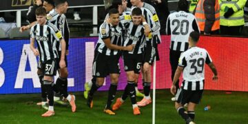 Newcastle players celebrate Lewis Miley’s stoppage-time winner against Fulham at St James’ Park, securing their place in the EFL Cup semi-finals.