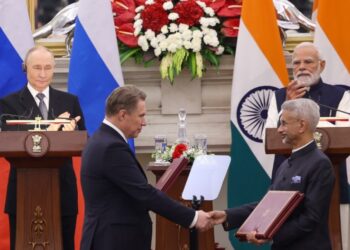 Vladimir Putin and Narendra Modi watch as both ministers exchange the memorandum of understanding Photo by X/@narendramodi