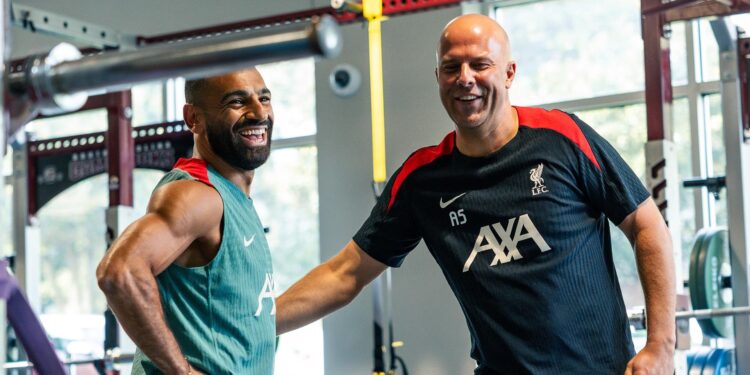Salah and Arne Slot share a moment during a gym session ahead of match preparations. Photo credit: Liverpool FC