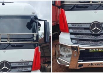 white and red Mercedes truck, registered LSD 233 DH