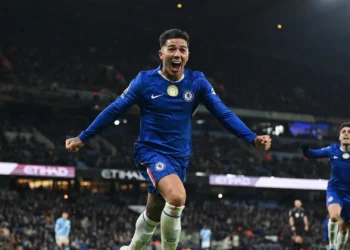 Enzo Fernandez celebrates his dramatic stoppage-time equalizer against Manchester City.