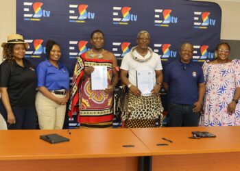 Representatives from Eswatini TV and the Premier League of Eswatini pose for a group photo following the signing of a Memorandum of Understanding to broadcast MTN Premier League Yello Sunday derby matches live.