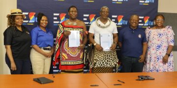 Representatives from Eswatini TV and the Premier League of Eswatini pose for a group photo following the signing of a Memorandum of Understanding to broadcast MTN Premier League Yello Sunday derby matches live.