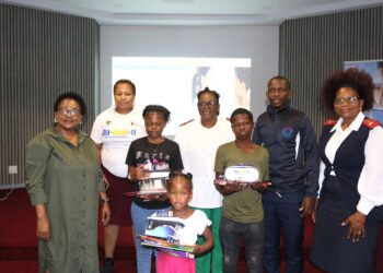 Children and young adults living with Type 1 diabetes pose for a group photo after receiving diabetes management equipment during a Ministry of Health programme in Mbabane. Photo by Ministry of Health Eswatini