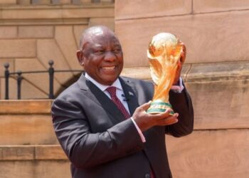 President Cyril Ramaphosa holds the FIFA World Cup Original Trophy during the ceremony at the Union Buildings in Pretoria. Photo by GCIS.