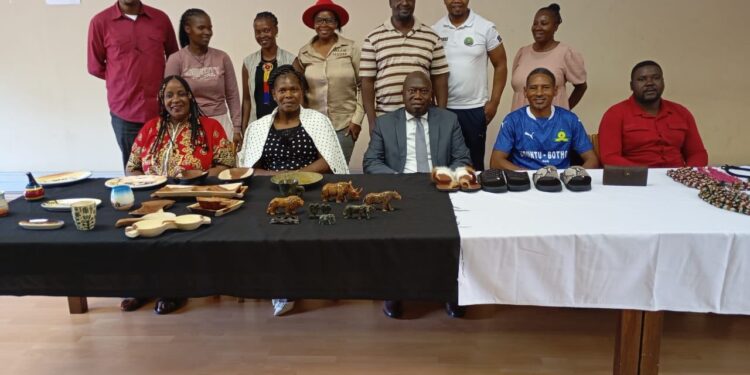 Principal Secretary at the Ministry of Commerce Industry and Trade Ambassador Melusi Masuku with Eswatini artisans selected to represent the country at the Surajkund Mela Crafts Fair in India, ahead of their departure.