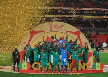 Senegal players celebrate as they lift the TotalEnergies CAF Africa Cup of Nations Morocco 2025 trophy after the final.
