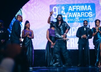 Rema, Best Male Artiste in Western Africa, receives his award at AFRIMA 2025 photo by X/@afrimaofficial