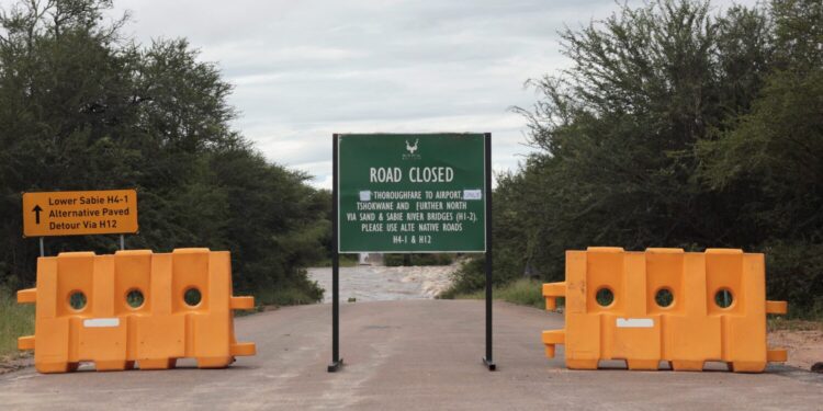 A sign reading 'road closed' after heavy rain at Kruger National Park in Mpumalanga, South Africa, January 15, 2026. REUTERS/Oupa Nkos