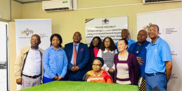 Minister of Tourism and Enviomental Affairs Jane Mkhonta-Simelane posing for the lenses with the newly appointed King Golf Cup task team