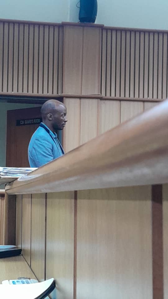 Nkosinathi Nkambule pictured in blue after being charged with driving under the influence of alcohol.