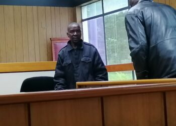 Mxolisi Memeza Nhleko appears in the dock at the Mbabane Magistrates Court after being sentenced to one year imprisonment for housebreaking with intent to steal.
