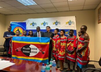 Minister Bongani Nzima, Mr Sriram of the Indian High Commission, and members of Eswatini’s cultural troupe pose during the official send-off for the Surajkund International Crafts Mela in New Delhi. Photo credit: Nosipho Mabuza
