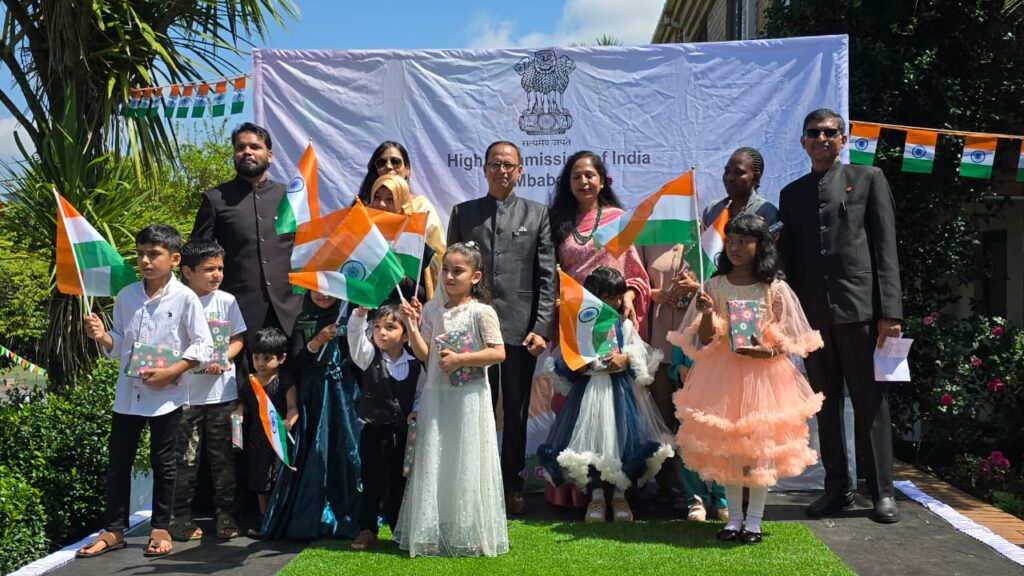High Commission officials with children from the Indian Diaspora