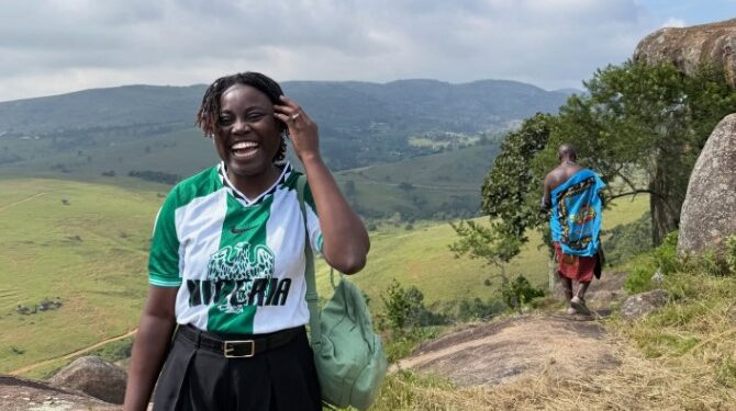 Adenike Daramola Joondeph at the Jubukweni Community Tours waterfall during her visit to Eswatini, where she is taking part in a tourism media tour showcasing community-based experiences.