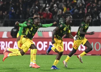 Mali's players celebrate after winning the last-16 game at Mohammed V Stadium in Casablanca [AFP]