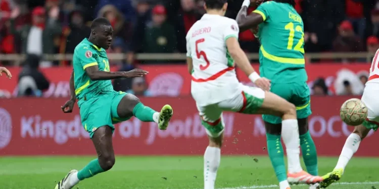 Senegal’s Pape Gueye scores the opener [Amr Abdallah Dalsh/Reuters]